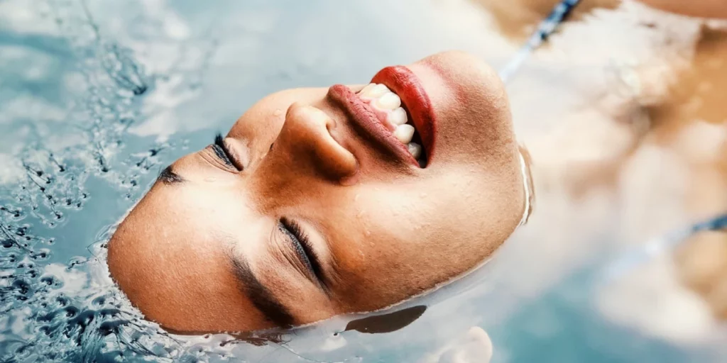 Woman lying in water Skin Health