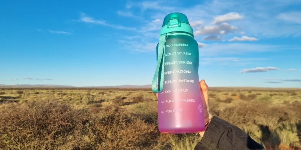 2L Tritan Water Bottle In the Bush Aurora Lights. Green Purple