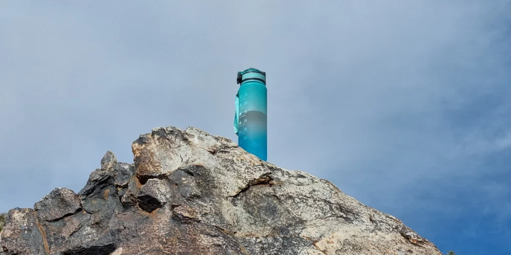 SKAULT 1L Tritan Water Bottles on a rock